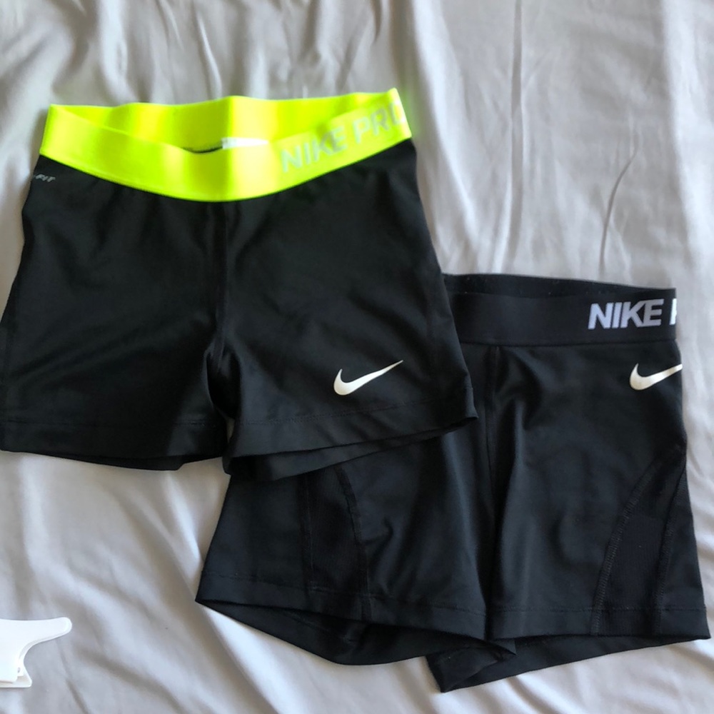 Two Nike pro spandex